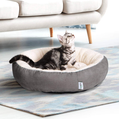 Cozy Oasis for Your Furry Friend: Luxurious Round Donut Cat and Dog Cushion Bed | Anti-Slip, Water-Resistant, and Super Soft | Perfect for Cats or Small Dogs